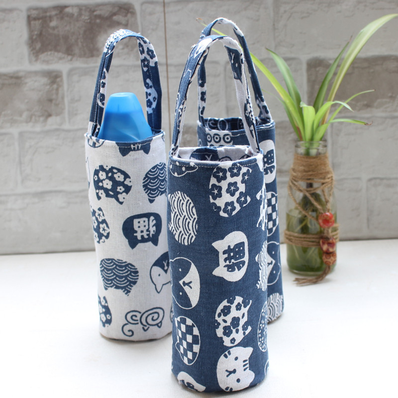 厂供手工棉麻布艺保温杯套防划痕水壶套可手提双面图案可爱杯套