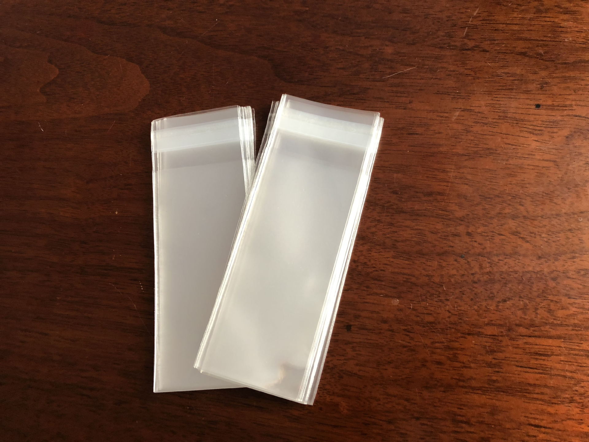 02成交18.3万pcsopp自粘袋高透明食品包装底风琴袋书套环保包装袋￥0.