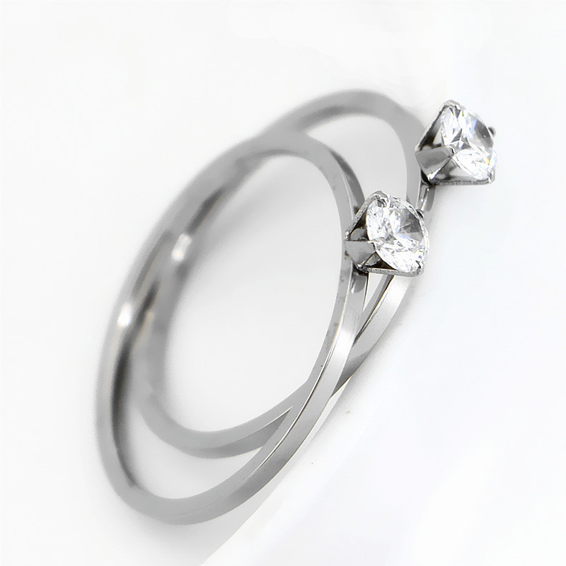 奥维洛韩版时尚钛钢铂金版单钻戒指女生尾戒潮流首饰婚戒创意设计