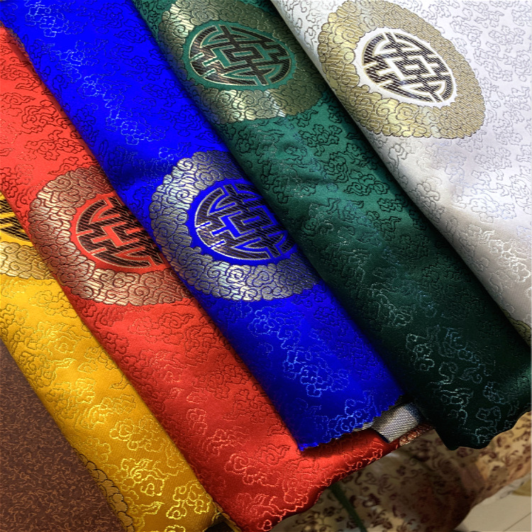 织锦缎提花面料藏装蒙古袍民族仿古儿童棉袄面料被套布料祥云团花