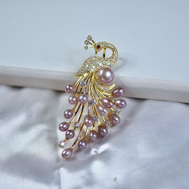 秋冬韩版衣饰天然淡水珍珠孔雀胸花源头工厂批发毛衣链胸针两用女