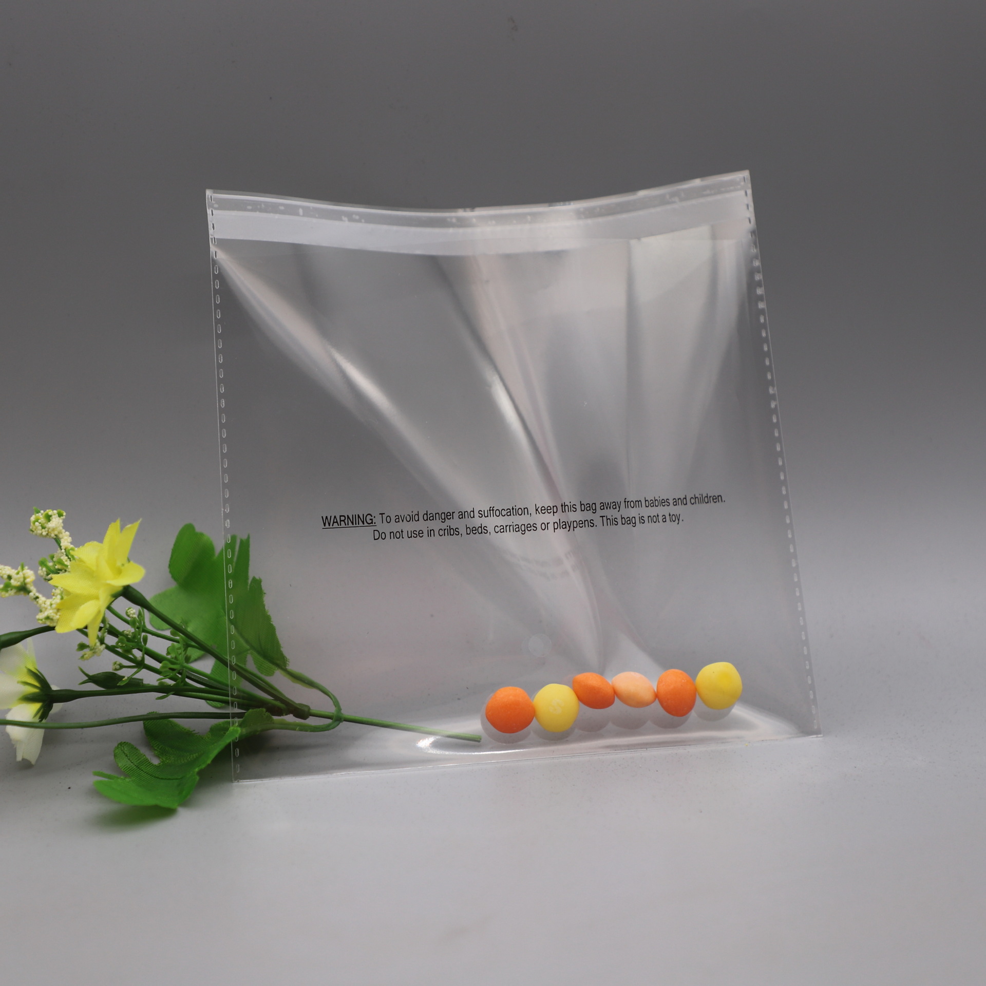 广州透明opp胶袋工厂印刷警示语塑封袋 现货花边警告标外贸袋