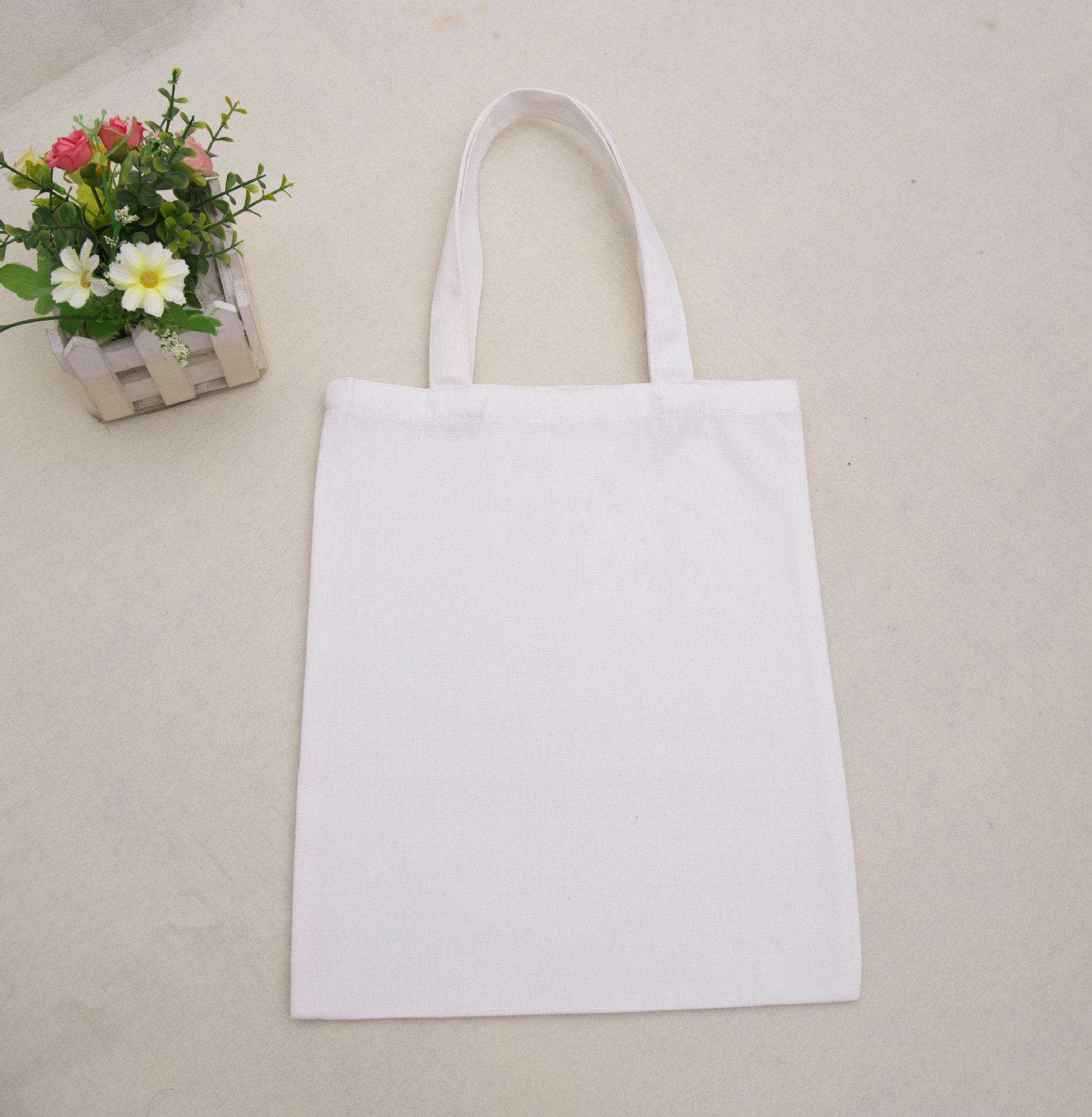 现货全棉手提帆布袋定做纯色可印logo广告礼品空白单肩棉布袋定制