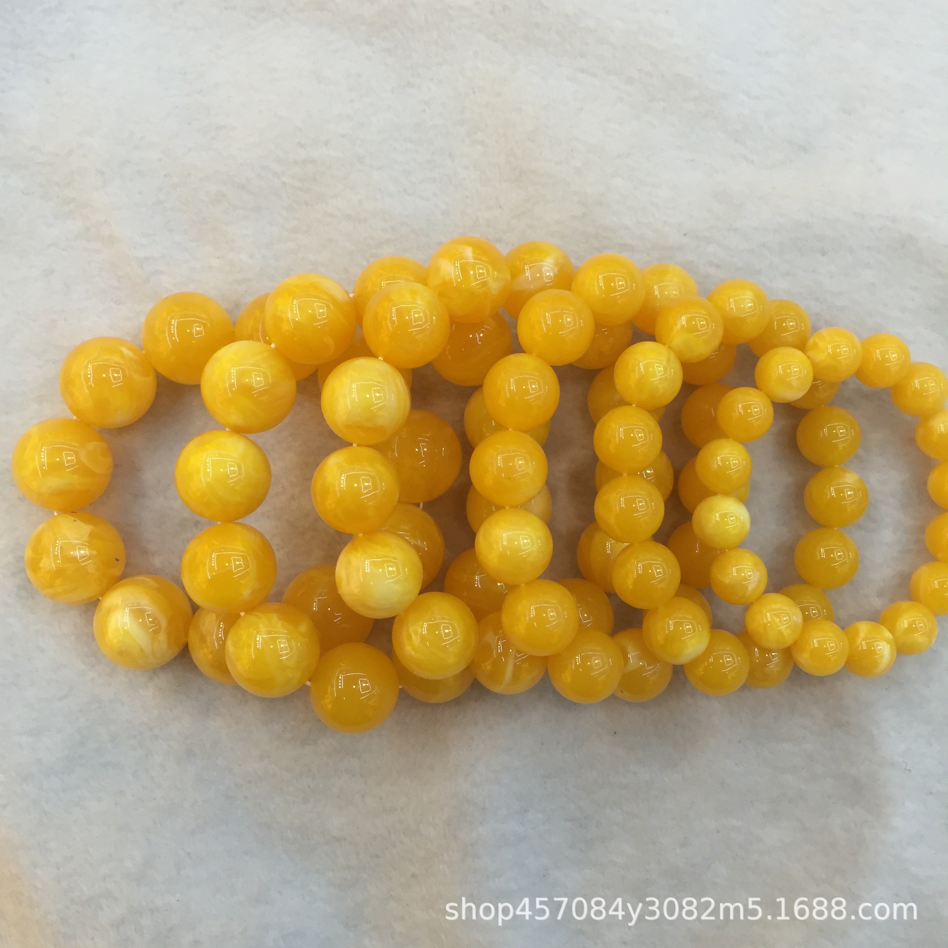 厂家批发二代荧光浮水琥珀蜜蜡手串地摊景点展会直播销售琥珀蜜蜡