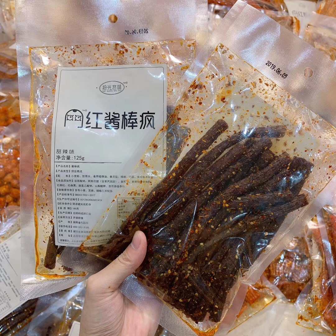 正品拾光悠味125g辣条网红微商爆款抖音同款麻辣食品辣皮辣卷辣棒