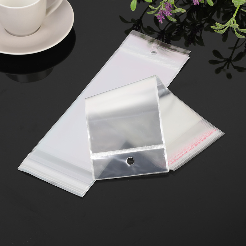 Spot OPP Transparent Card Bag Jewelry Earrings Jewelry Plastic Packaging Bag Phone Case White Hanging Head Bag