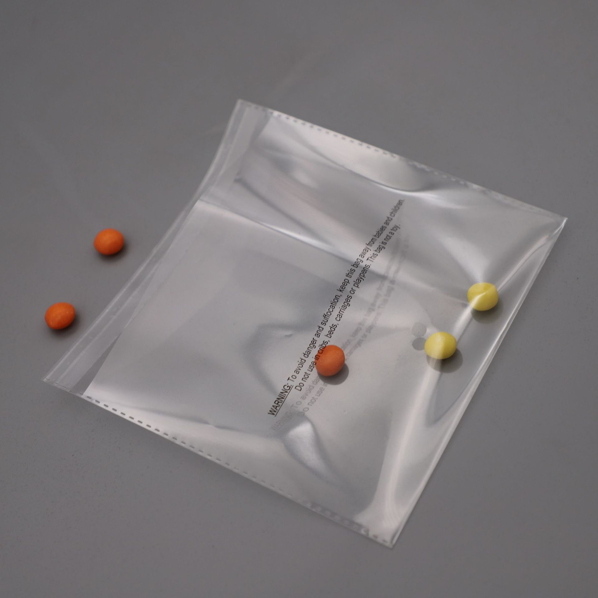 广州透明opp胶袋工厂印刷警示语塑封袋 现货花边警告标外贸袋