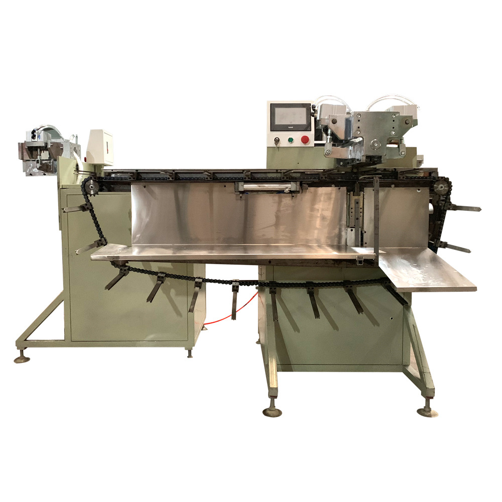 滤清器设备:滤清器纸芯全自动夹铁机