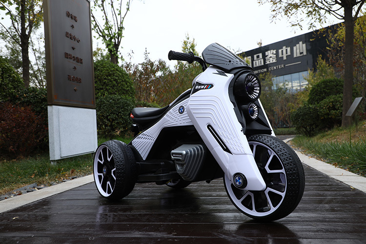 厂价直销新款概念儿童电动摩托车电动三轮车带早教男女宝宝玩具车