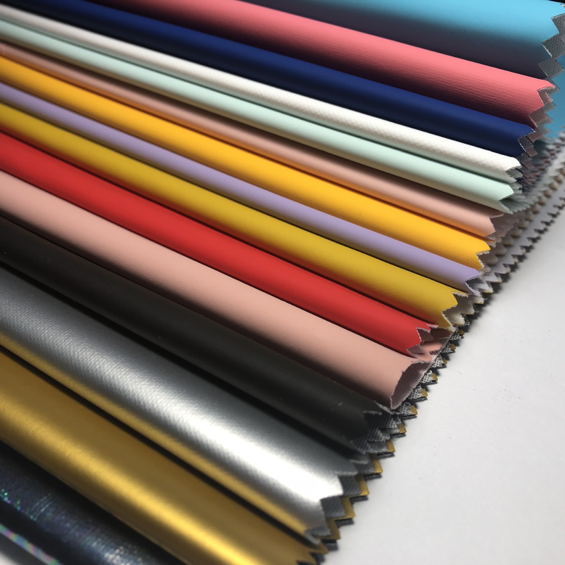 针织布离型纸转移涂层面料 防水四面弹力皮肤感pu皮革呼吸面料