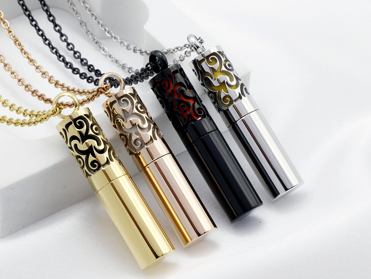 厂家直销 不锈钢香水吊坠 镂空精美花纹香薰项饰精油项链圆柱形