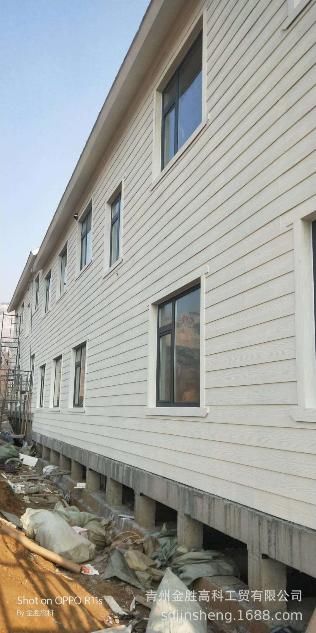 轻钢房屋建筑材料生产厂家供应别墅外墙挂板 外墙木纹板 防火防虫