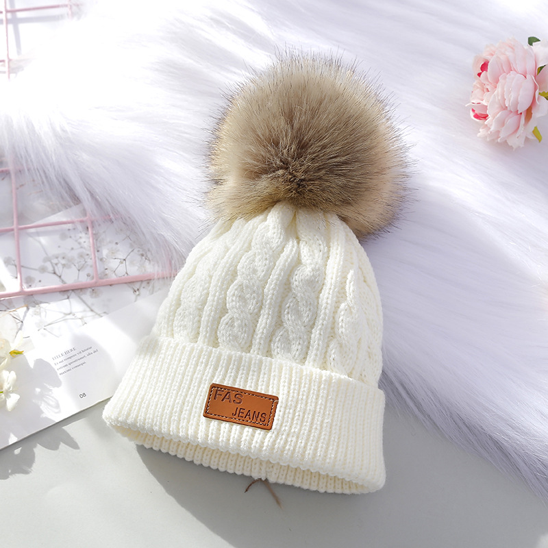 2023 Winter Children's Warm Wool Hat Twist Fur Ball Knitted Hat Letter Labeling Hat Factory Wholesale