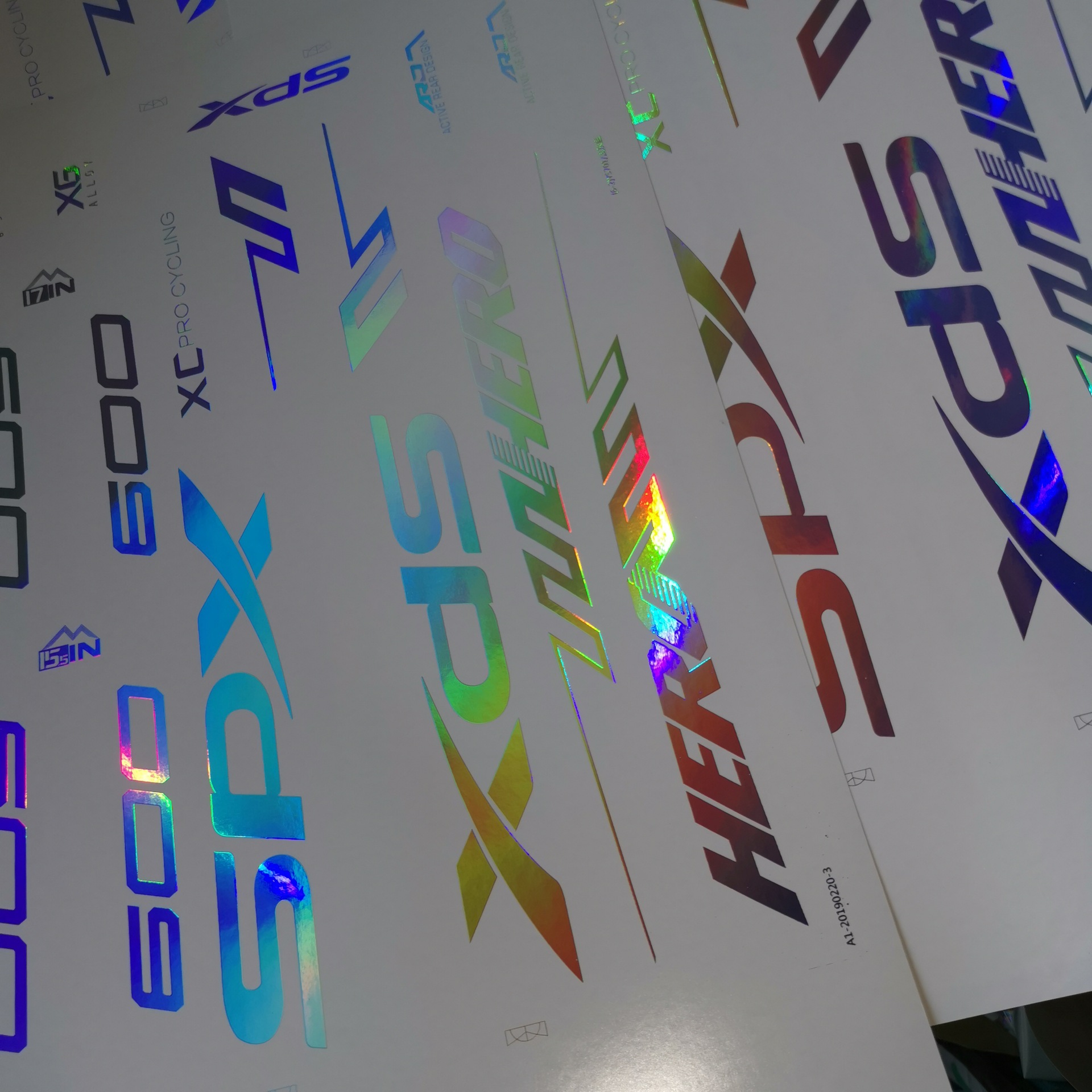 自行车架标uv不起皱金色亮银水转印烫金纸烫印膜镭射纸水转移花膜