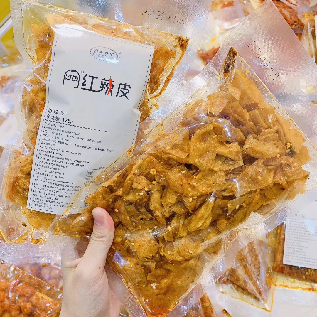 正品拾光悠味125g辣条网红微商爆款抖音同款麻辣食品辣皮辣卷辣棒