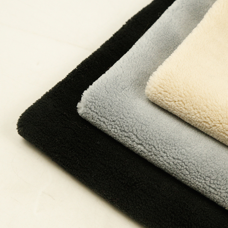 现货羊剪绒精品小颗粒羊羔绒布料仿羊绒面料仿羊羔毛布料