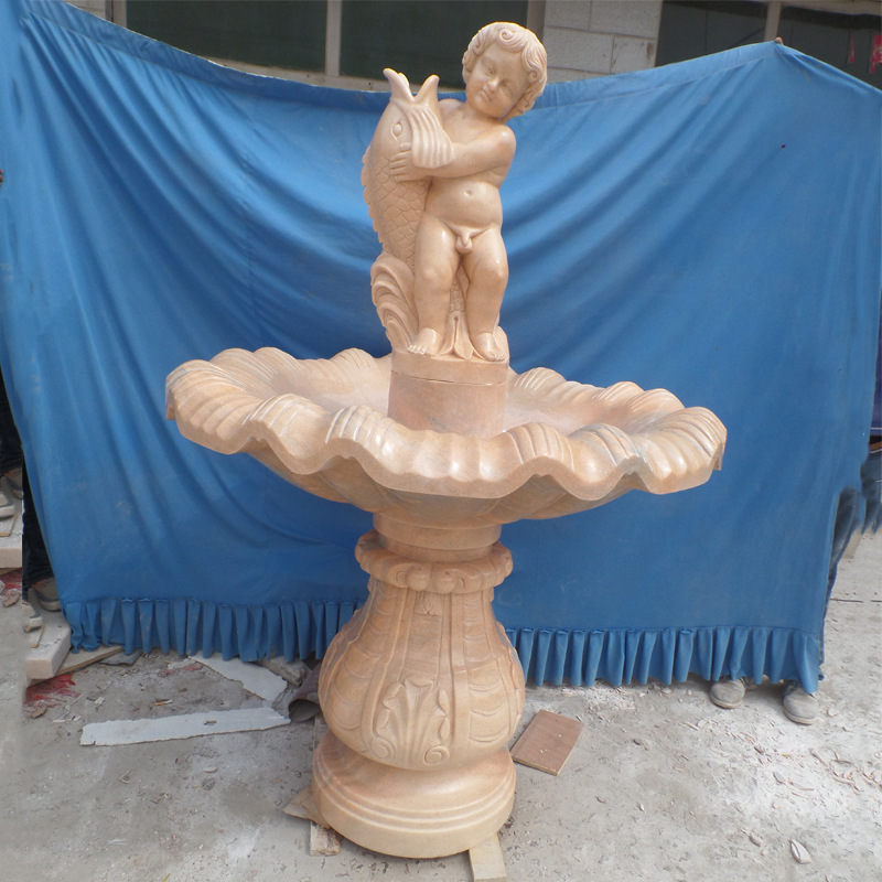 小孩抱鱼造型石雕喷泉工厂直销晚霞红大理石人物景观石材喷泉
