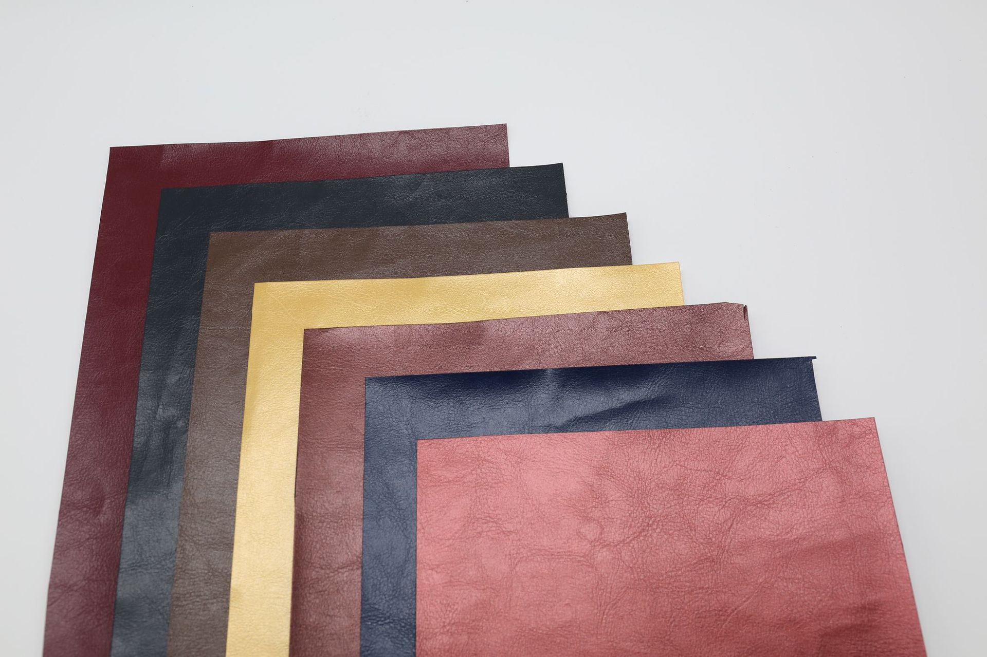 充皮纸厂家绿色触感纸细皮纹环保pu充皮纸高档手表盒绿色特种纸