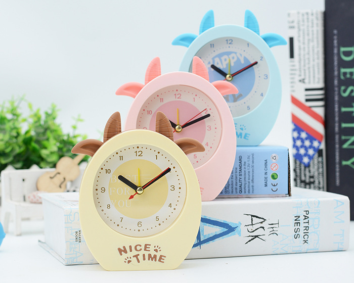 十元店货源萌牛卡通闹钟钟表批发日用百货圣诞礼品出口精品