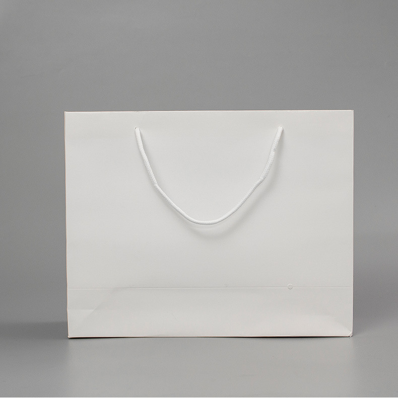 空白纸手提袋定制白卡纸袋加厚服装店衣服收纳袋定制可印logo