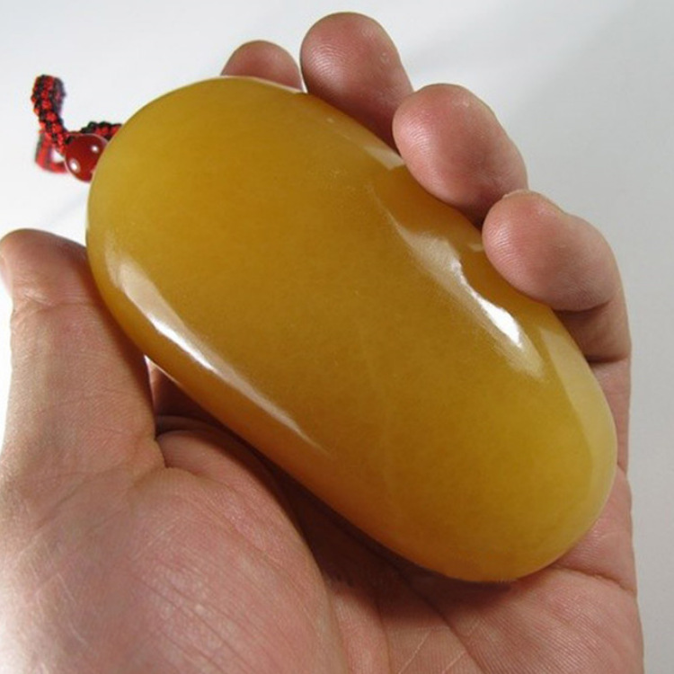 天然玉石米黄玉貔貅手把件批发黄龙玉原石随型招财辟邪貔貅手玩件