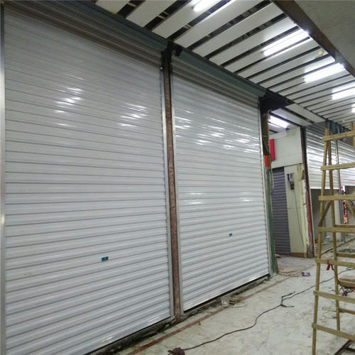 粤祥门业厂家直销:澳式无声门 手动卷帘门 商铺手动门 仓库门