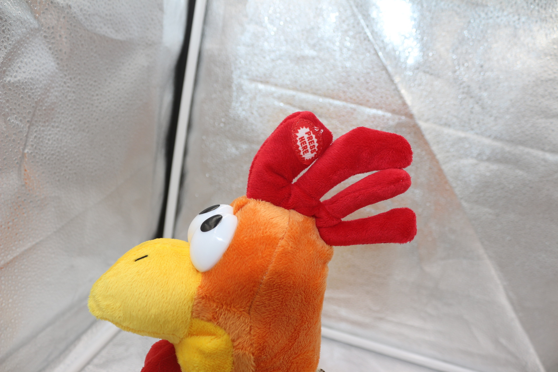 跨境新款厂家直销电动毛绒玩具 复活节鸡 拎脖子疯狂惨叫鸡拍翅膀