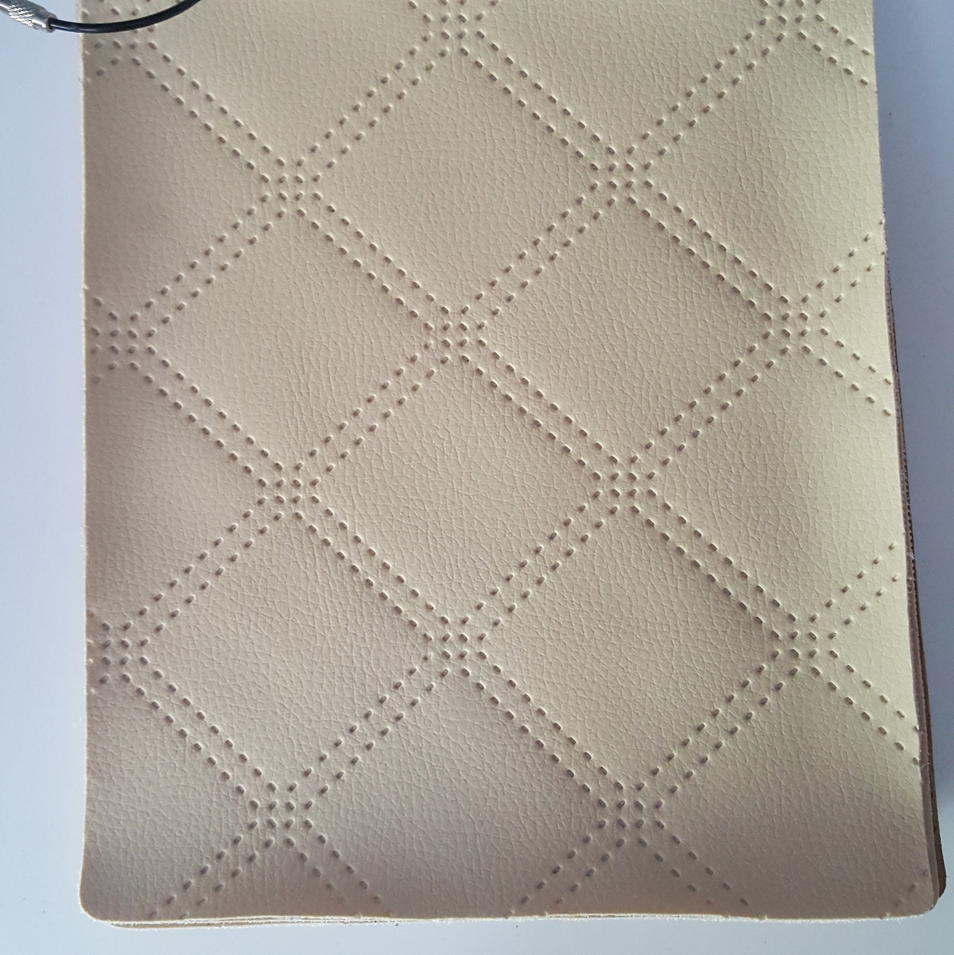 厂家定制几何图案pvc皮革打孔压花皮革凹凸纹pvc皮革硬包皮革
