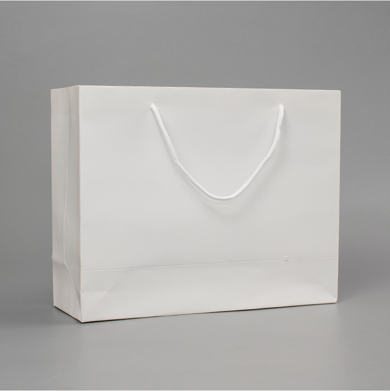 重庆市空白纸手提袋定制白卡纸袋加厚服装店衣服收纳袋定制手提袋