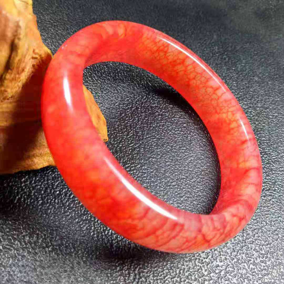 厂价特惠精品东北岫玉镯子鸡血玉手镯 冰莹时尚岫玉手镯