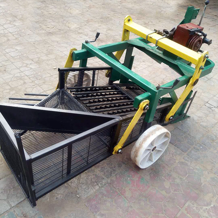 花生收获机_河南单缸传动收花生机多缸车带平地振动筛花生 - 阿里巴巴