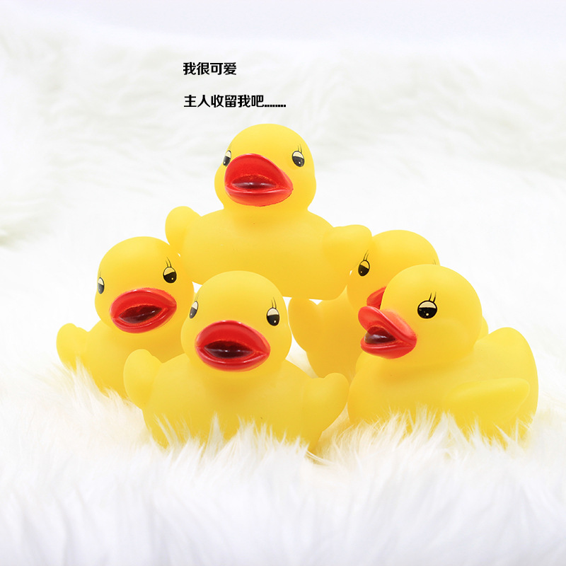 led闪光小黄鸭 新奇特搪胶七彩儿童洗澡玩具防水 遇水发光小黄鸭