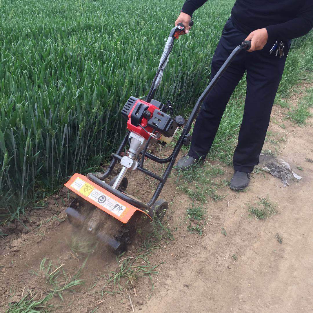 专业生产手推荒地旋耕松土机 背负式混合油锄草机 微型除草机