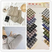 厂家直供现货供应涤纶弹力色织三色格子 色织韩国格子女装面料