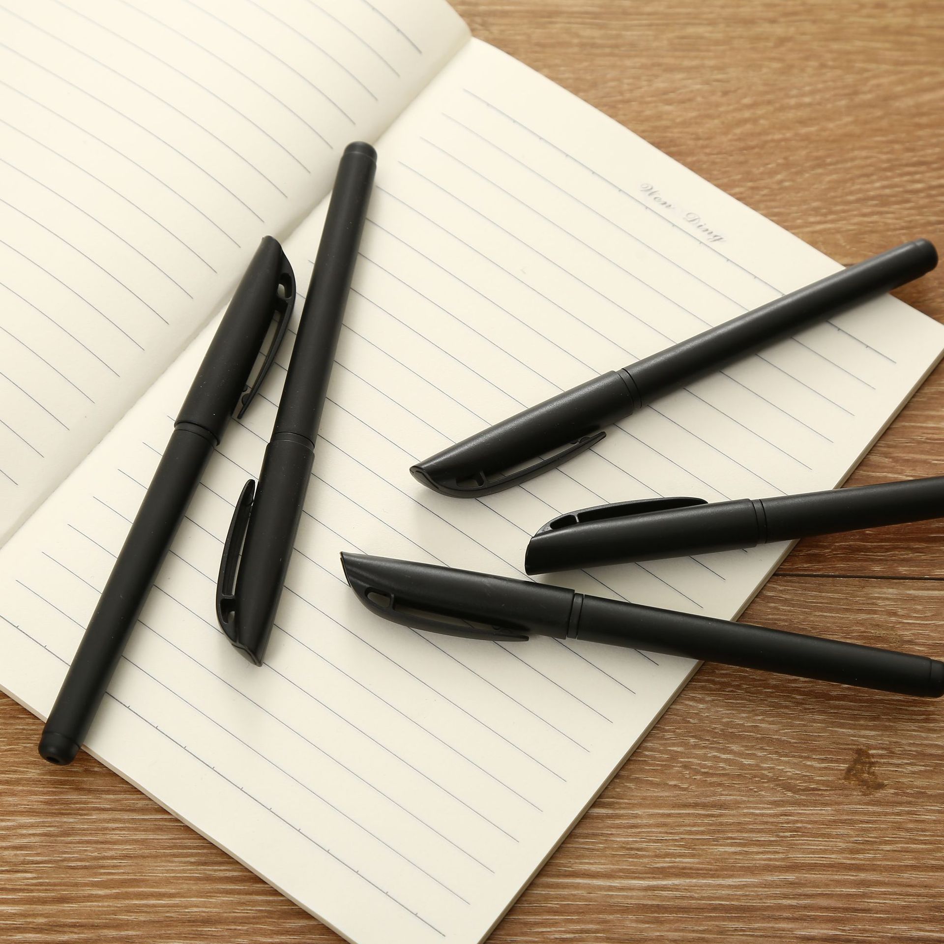 中性笔定制logo书写不断墨学生办公用品黑色笔广告笔签字笔-阿里巴巴