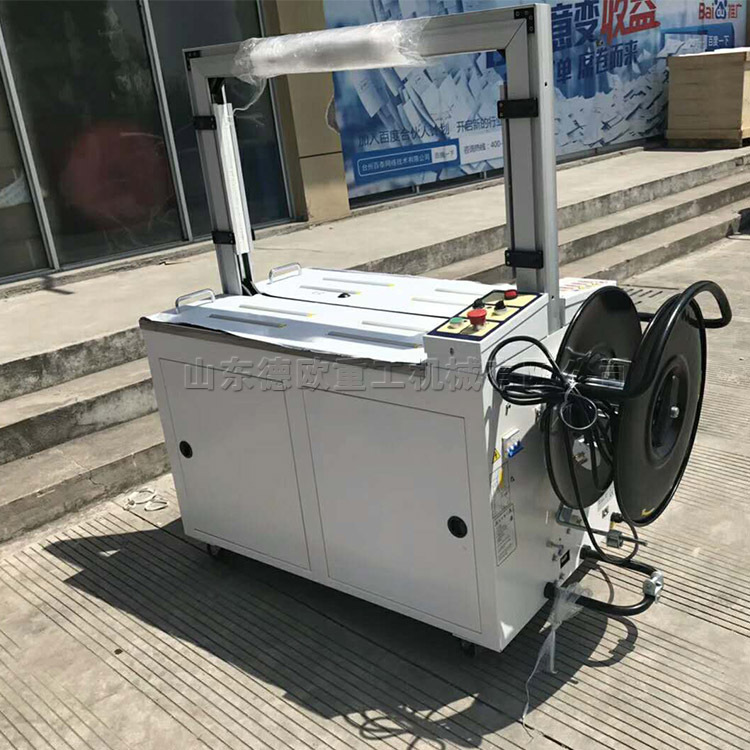 全自动热熔融扎带打包机打印纸自动捆扎机纸箱包裹捆扎带包装机