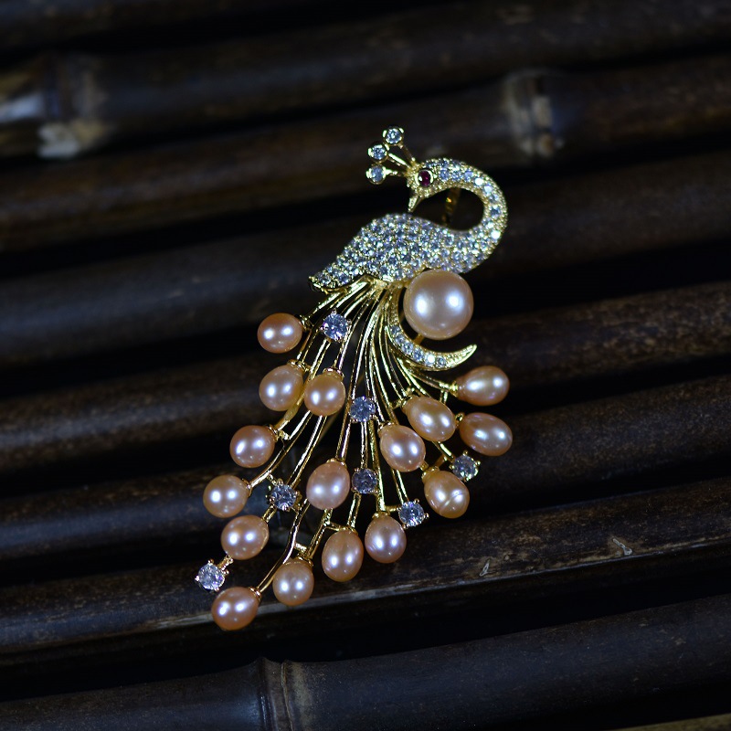 秋冬韩版衣饰天然淡水珍珠孔雀胸花源头工厂批发毛衣链胸针两用女