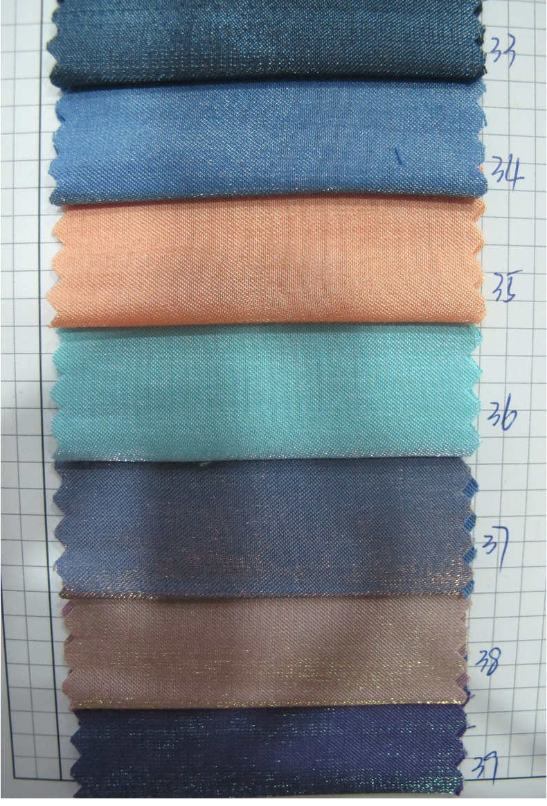 现货供应闪光棉s676全涤时装梭织衬衫连衣裙布料汉服亮丝面料批发