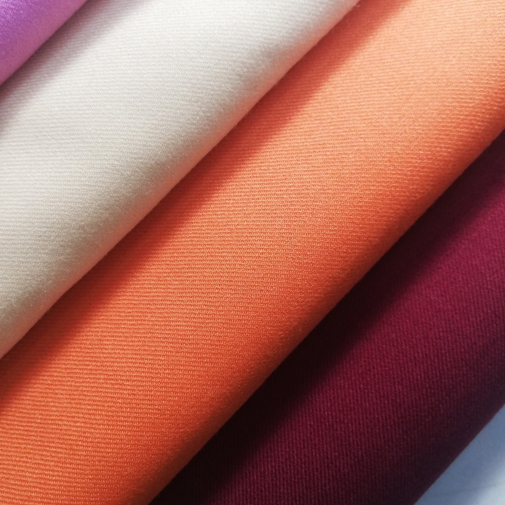 氨纶弹力莱卡女装西装西裤面料黄色粉色桔色精纺羊毛秋冬面料现货