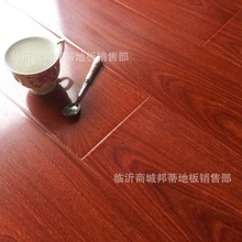 12mm强化复合地板厂家直销耐磨防水高光亮面酒店工程家用木地板