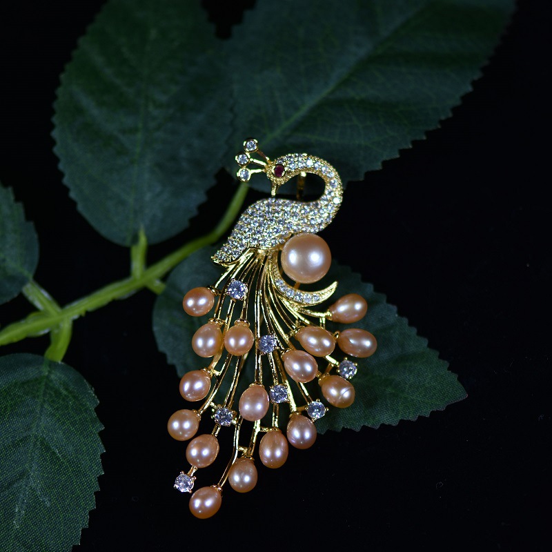 秋冬韩版衣饰天然淡水珍珠孔雀胸花源头工厂批发毛衣链胸针两用女