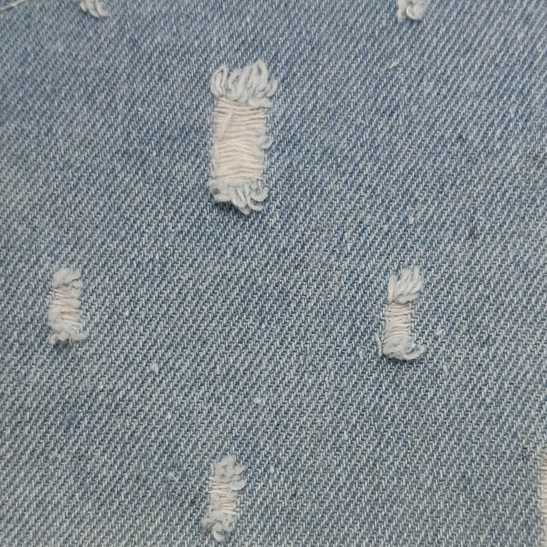 牛仔面料 10*10斜纹钩花破洞牛仔 10oz 外套面料 箱包鞋材需定做