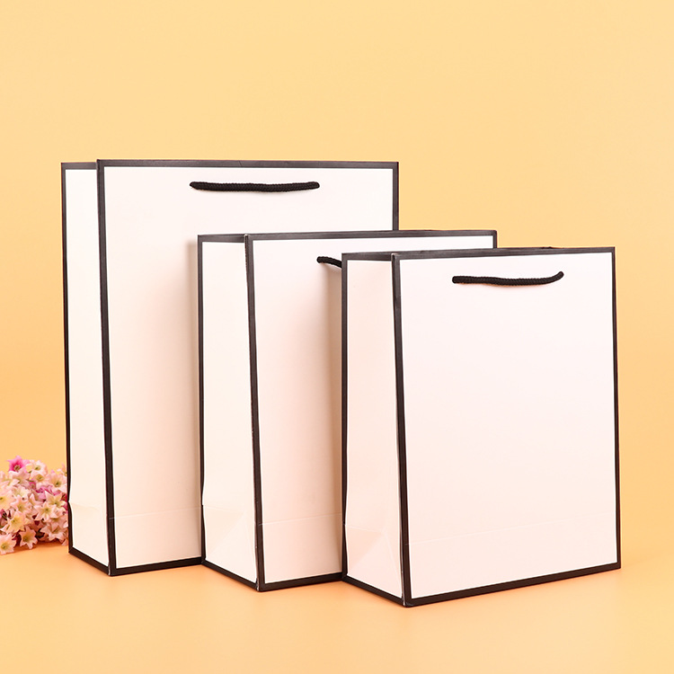 现货供应手提袋 包装印刷服装袋批发 白卡纸广告logo礼品袋订做