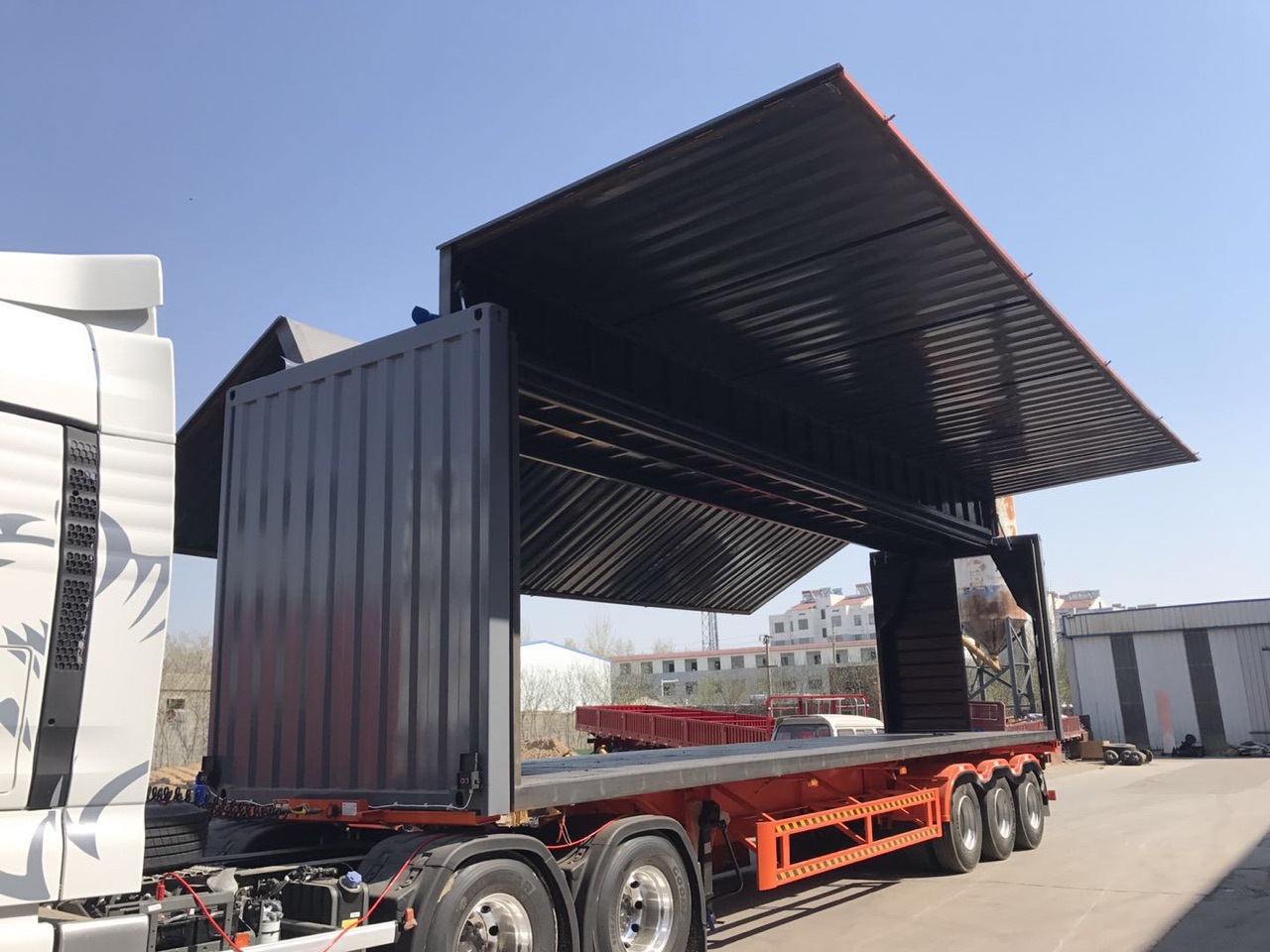 骨架式集装箱运输半挂车 轻型后翻侧翻自卸半挂车 平板半挂车价格