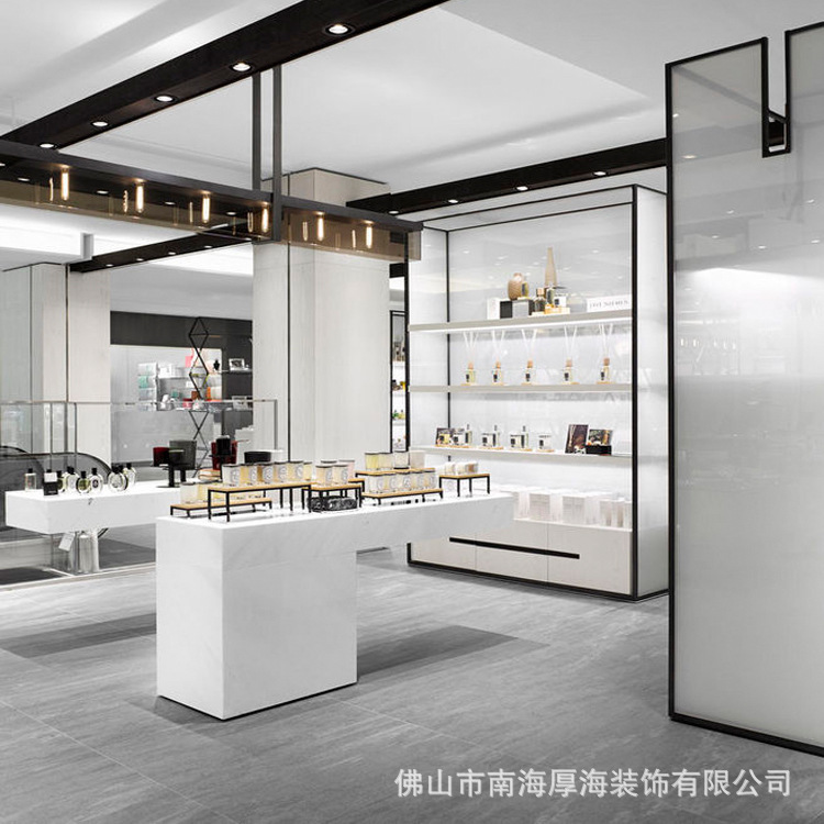佛山精品展示柜厂家白色烤漆展台中岛香水柜台制作发光香水展示架