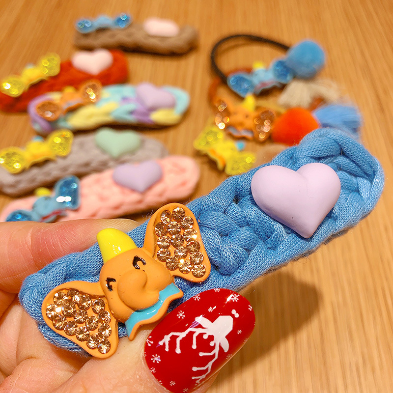 hd13779a04韩国东大门小象亮钻耳朵毛球流苏发夹bb夹发绳发圈头饰