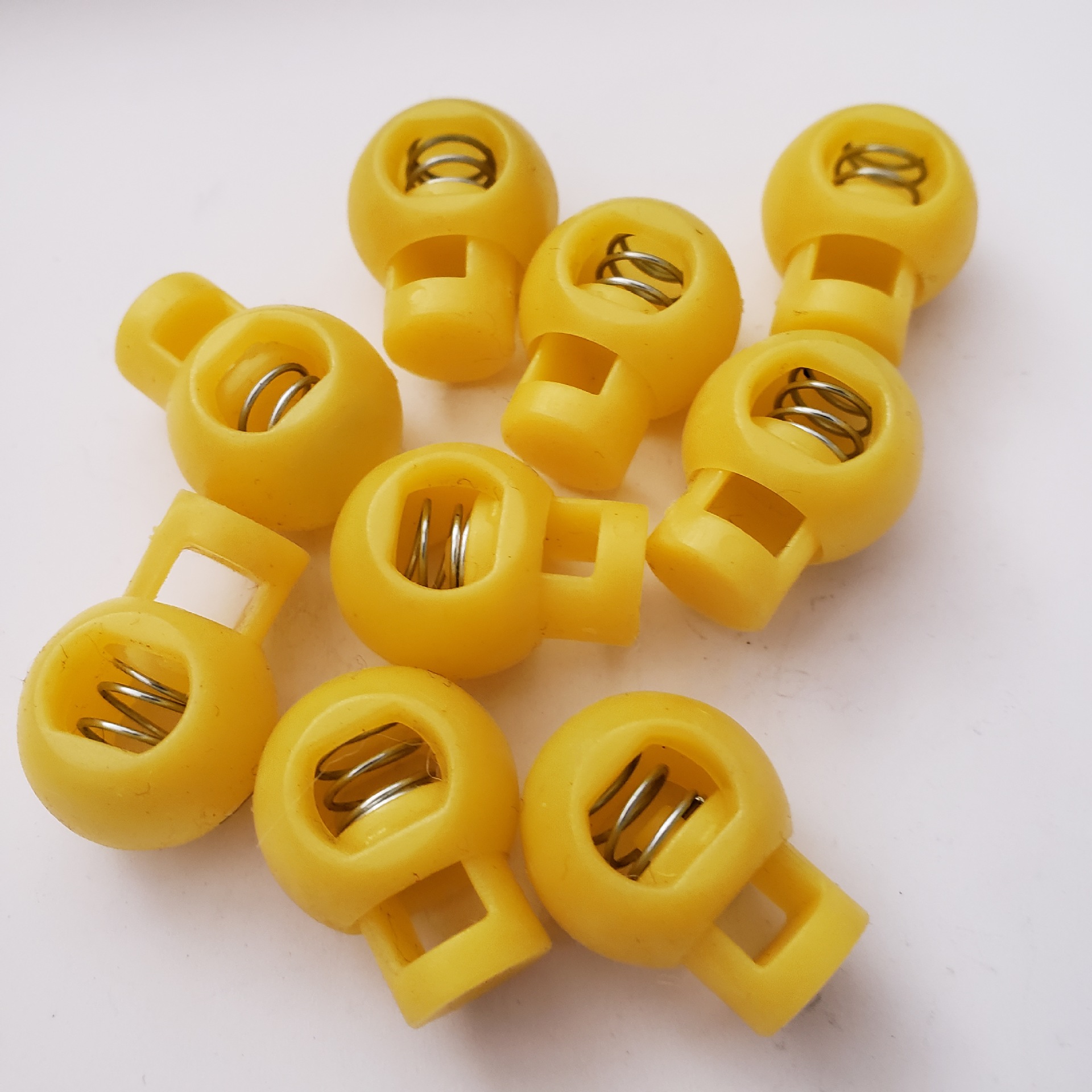 塑料绳扣abs弹簧卡扣双孔猪鼻孔外套橡筋纽扣止绳卡子吊钟