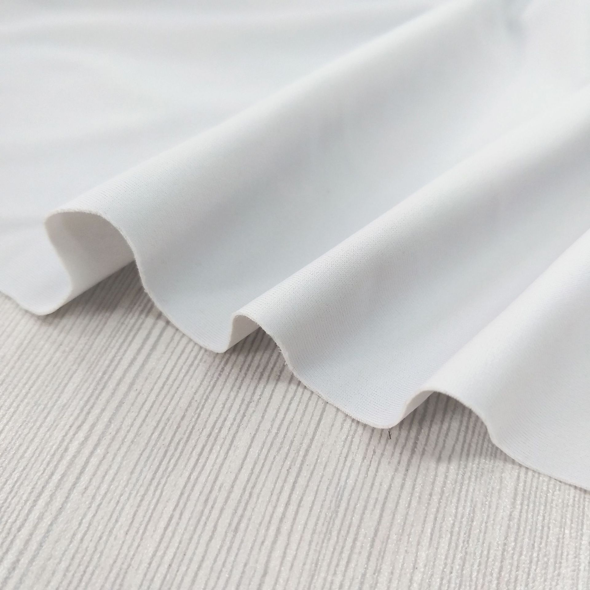 弹力40d锦氨经编泳布