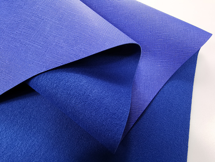 厂家直销pvc皮革面料十字纹牙签纹箱包手袋革化妆包人造革面料