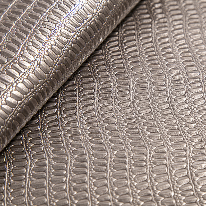 新款鳄鱼纹装饰革冲孔纹pu压纹皮革料硬包pu革皮料优惠批发